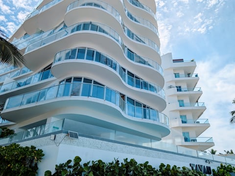 Beachfront condominiums in tropical setting